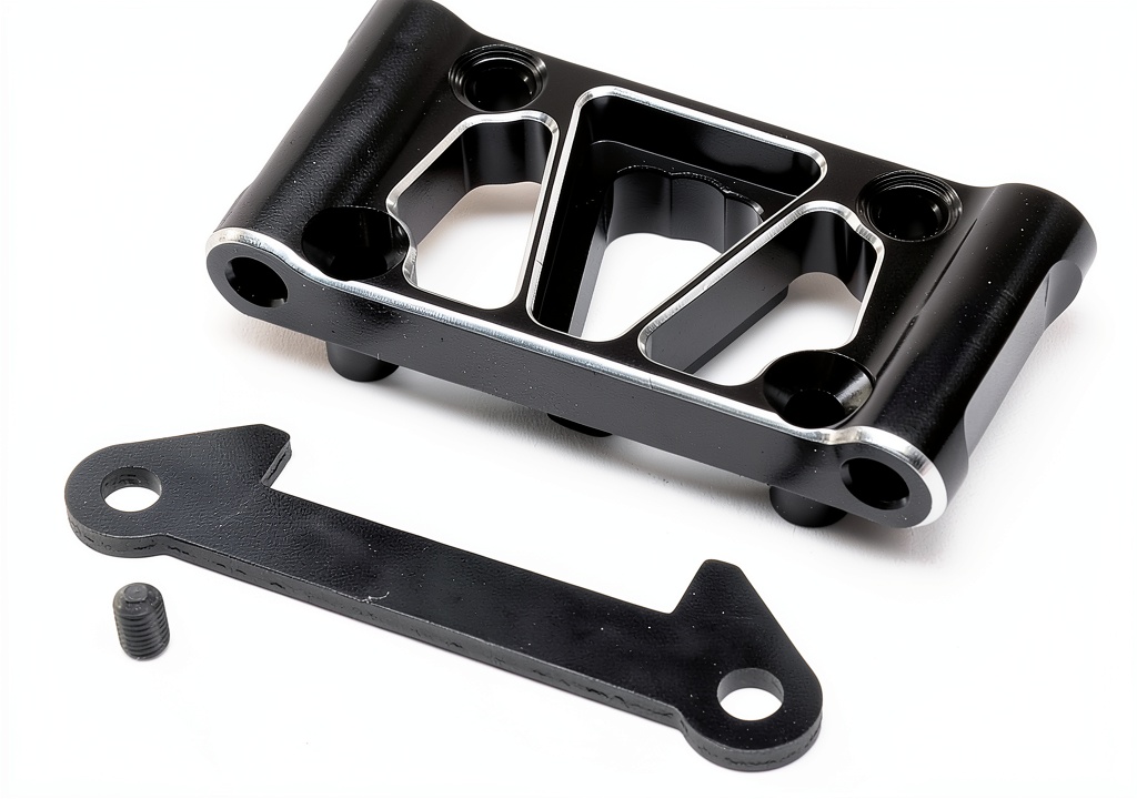 Team Losi front pivot installed in an RC car engine